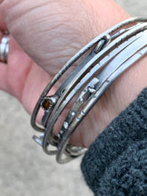 Load image into Gallery viewer, Custom Sterling Silver &quot;Cross Paths&quot; Stamped Line Bangle
